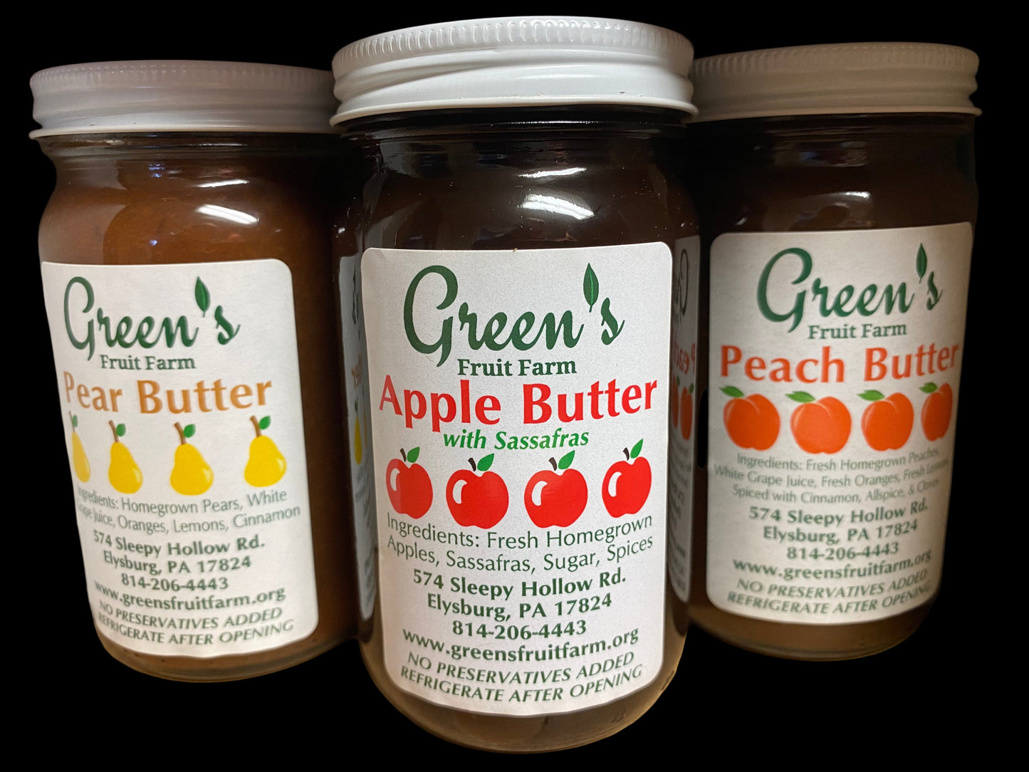 Three jars of Green's Fruit Farm butter on a shelf.